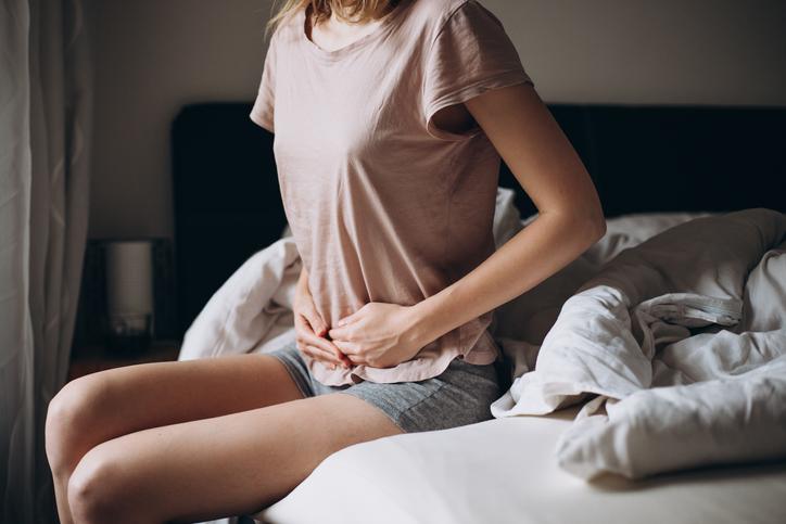 How can menstrual cramps be relieved?